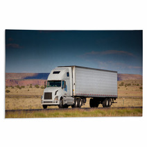 Semi-truck On The Road In The Desert Rugs 52457044