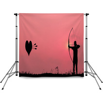 Silhouette Archery Shoots A Bow At The Heart Shape Target In The Backdrops 68462228