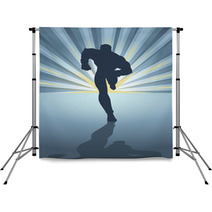 Silhouette Of A Male Figure Running In Front Of Light Burst Backdrops 68304302