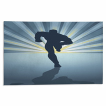 Silhouette Of A Male Figure Running In Front Of Light Burst Rugs 68304302