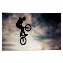Silhouette Of A Man Doing An Jump With A Bmx Bike Rugs 57935081