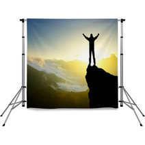 Silhouette Of A Winner On The Mountain Top. Active Life Concept Backdrops 60757797