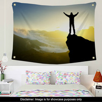 Silhouette Of A Winner On The Mountain Top. Active Life Concept Wall Art 60757797