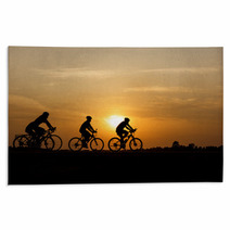 Silhouette Of Cycling On Sunset Background Rugs 108909430