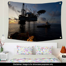 Silhouette Of Offshore Jack Up Rig At Sea During Sunset Wall Art 62462697