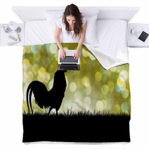 Silhouette Of Roosters Crow On The Lawn On Green Boken Backgroun Blankets 88485620