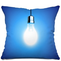 Single Lightbulb Shining A Bright Light On Blue Background Pillows 65162695