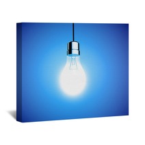 Single Lightbulb Shining A Bright Light On Blue Background Wall Art 65162695