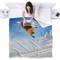 Snowboarder Jumping Against Blue Sky Blankets 34344721