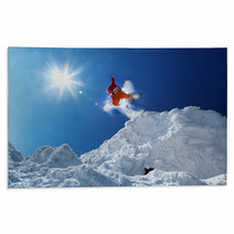 Snowboarder Jumping Against Blue Sky Rugs 48924842