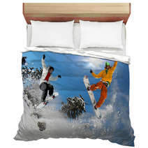 Snowboarders Jumping Against Blue Sky Bedding 37675042