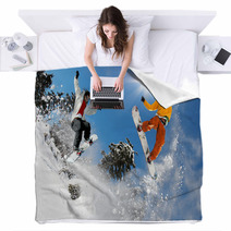 Snowboarders Jumping Against Blue Sky Blankets 37675042
