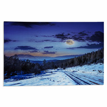 Snowy Road To Coniferous Forest In Mountains At Night Rugs 60624201