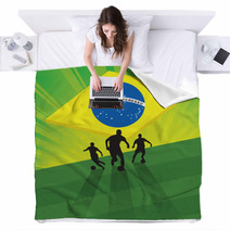 Soccer Player On Green Light Background Blankets 65834448