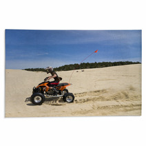 Speeding Quad In Sand Dunes Rugs 22546722