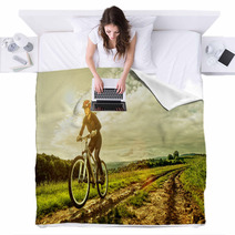 Sport Bike Woman On A Meadow With A Beautiful Landscape Blankets 64906341