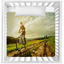 Sport Bike Woman On A Meadow With A Beautiful Landscape Nursery Decor 64906341