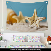 Starfish On Sand And Blue Background Wall Art 64985103