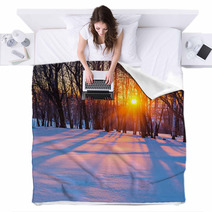 Sunset In Winter Forest Blankets 72918367