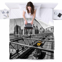 Taxi Cab Crossing The Brooklyn Bridge In New York Blankets 61714883