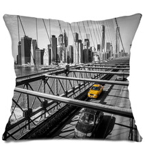Taxi Cab Crossing The Brooklyn Bridge In New York Pillows 61714883