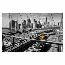 Taxi Cab Crossing The Brooklyn Bridge In New York Rugs 61714883