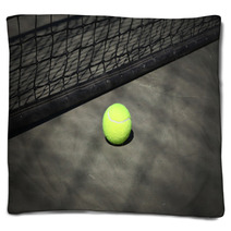 Tennis Ball On The Court With The Net On The Background Blankets 65484920