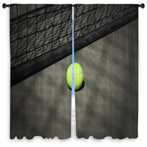 Tennis Ball On The Court With The Net On The Background Window Curtains 65484920