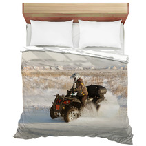 Terrain Vehicle In Motion At Winter Sunny Day Bedding 62734822