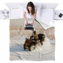 Terrain Vehicle In Motion At Winter Sunny Day Blankets 62734822