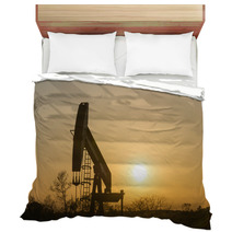 Texas Oil Well Against Setting Sun Bedding 61657158