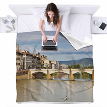 The Bridge Of Santa Trinita Over The Arno River In Florence Blankets 68475317