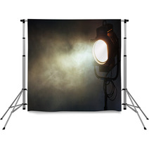 Theater Spot Light With Smoke Against Grunge Wall Backdrops 92589310