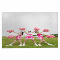 Three Cheerleaders Cheering With Pom Pom Rugs 171422673