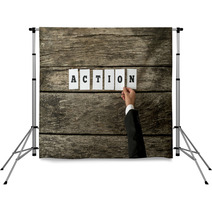 Top View Of Male Hand Assembling The Word Action Backdrops 94991747
