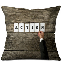 Top View Of Male Hand Assembling The Word Action Pillows 94991747