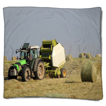 Tractor Collecting Haystack In The Field Blankets 54481931