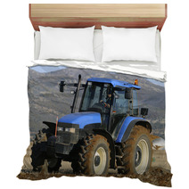 Tractor Plowing The Field On Mountains Bedding 51509437