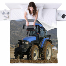 Tractor Plowing The Field On Mountains Blankets 51509437