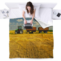 Tractor With Trailers On The Agricultural Field Blankets 53966202
