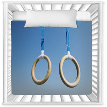 Traditional Wooden Gymnast Rings Hanging From Blue Straps In Clear Blue Sky Nursery Decor 93445411
