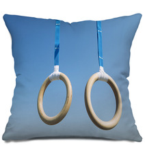 Traditional Wooden Gymnast Rings Hanging From Blue Straps In Clear Blue Sky Pillows 93445411