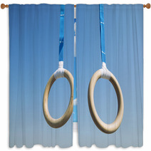 Traditional Wooden Gymnast Rings Hanging From Blue Straps In Clear Blue Sky Window Curtains 93445411
