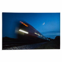 Train Speeding Passed In Blur At Night Rugs 64827814
