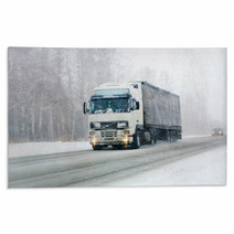 Truck Goes On Winter Road Rugs 40699442