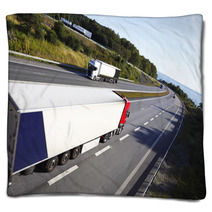 Trucks In Opposite Directions On Freeway Blankets 55686875