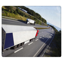 Trucks In Opposite Directions On Freeway Rugs 55686875