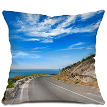 Turn Of Mountain Highway With Dramatic Blue Sky And Sea Pillows 57698760