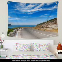 Turn Of Mountain Highway With Dramatic Blue Sky And Sea Wall Art 57698760