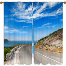 Turn Of Mountain Highway With Dramatic Blue Sky And Sea Window Curtains 57698760